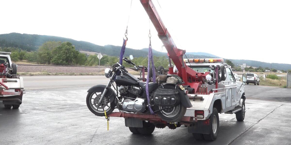 Towing and roadside assistance motorcycle towing